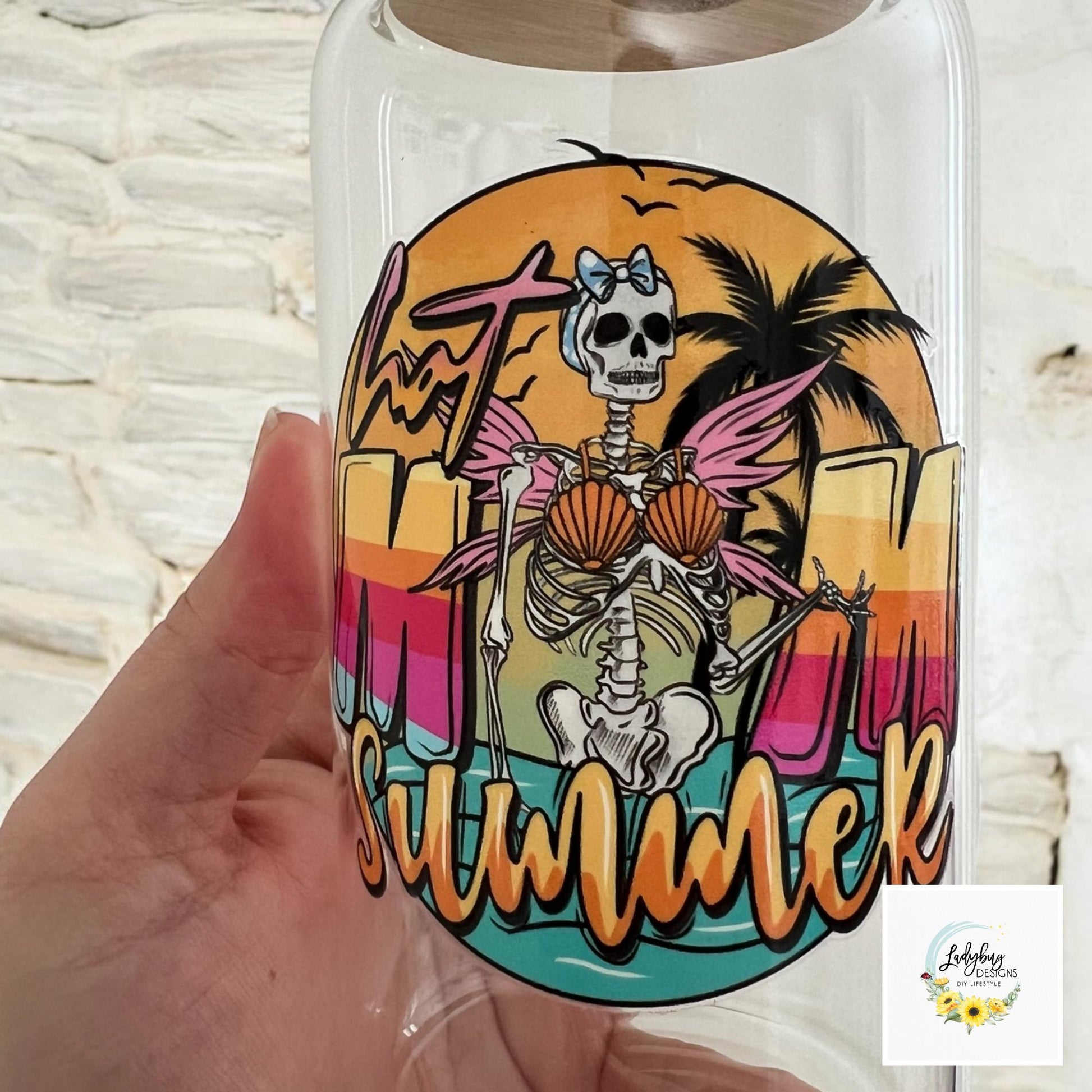 Hot Mom Summer Cup with bamboo lid and plastic straw. Features a 16 oz beer can glass design with permanent UV DTF transfer. Perfect for iced coffee and summer vibes. Ideal as a funny and sarcastic gift, with hand wash care instructions.