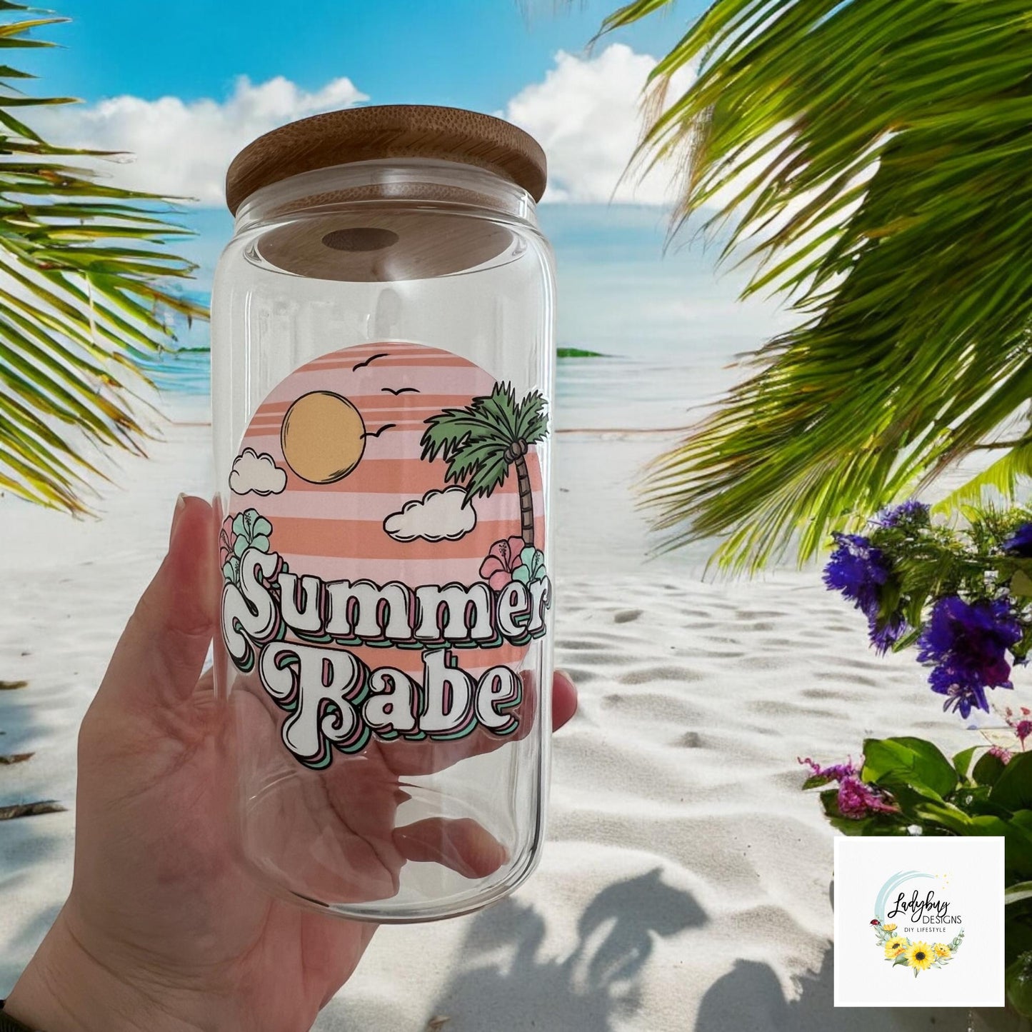 Summer Babe Sarcastic Cup with bamboo lid and plastic straw. Features a 16 oz beer can glass design with permanent UV DTF transfer. Perfect for iced coffee and summer vibes. Ideal as a funny and sarcastic gift, with hand wash care instructions.