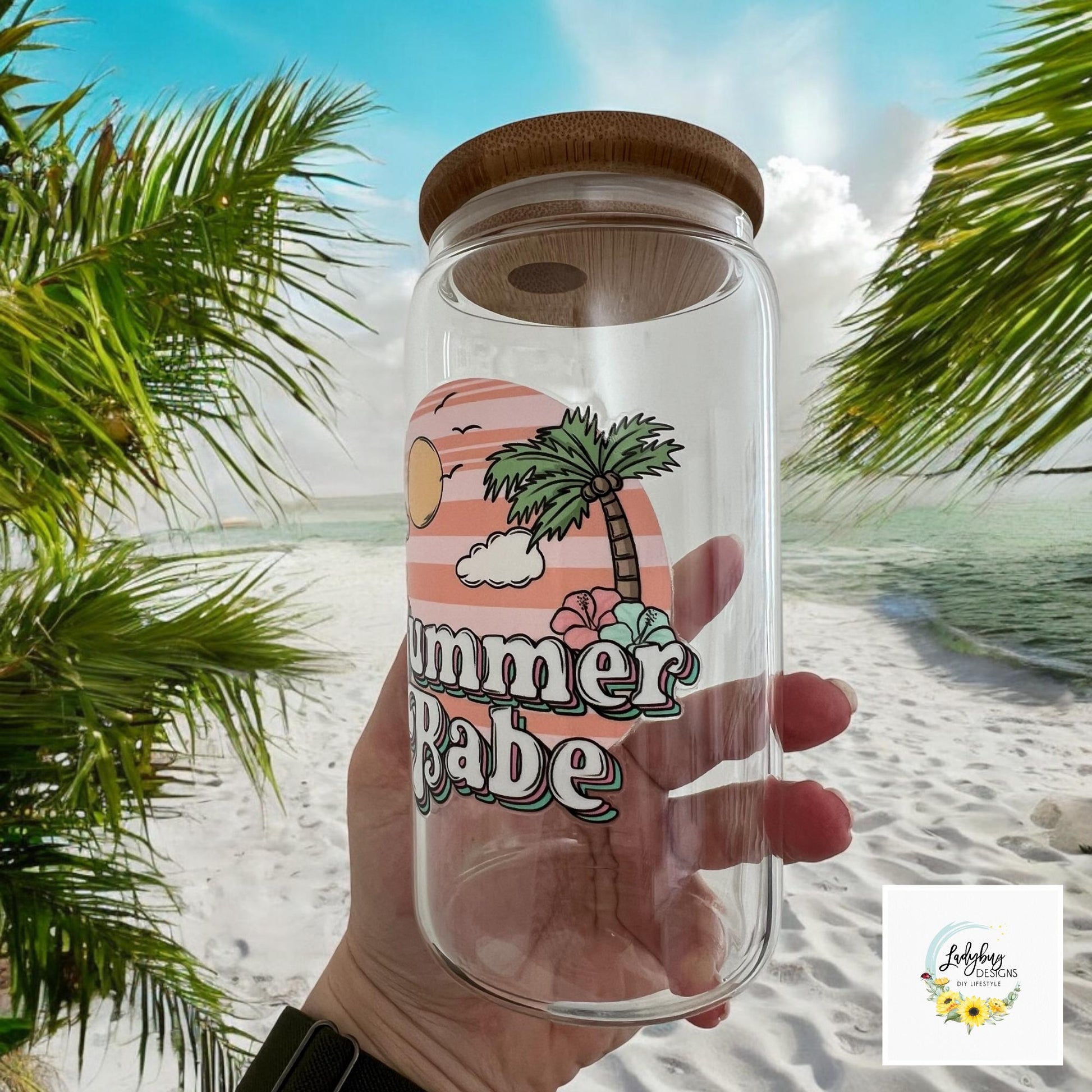 Summer Babe Sarcastic Cup with bamboo lid and plastic straw. Features a 16 oz beer can glass design with permanent UV DTF transfer. Perfect for iced coffee and summer vibes. Ideal as a funny and sarcastic gift, with hand wash care instructions.