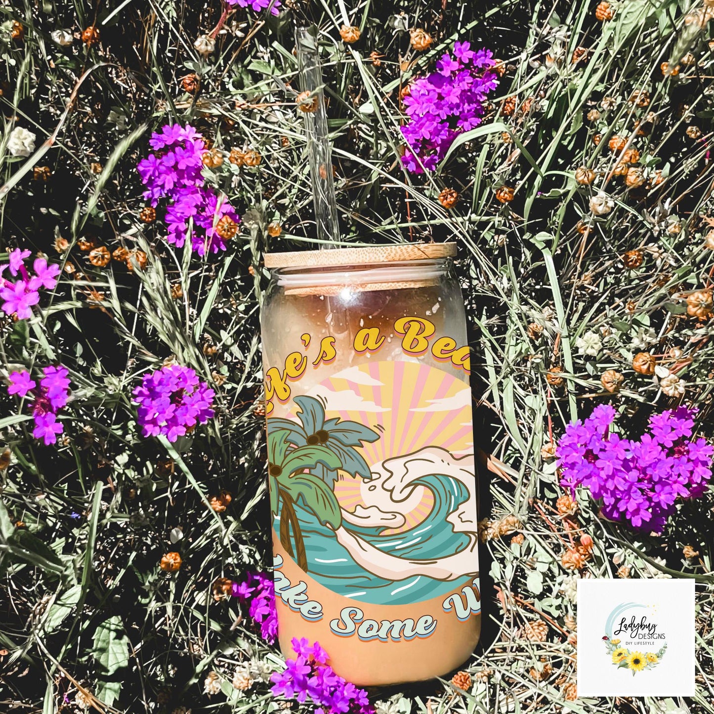 Life&#39;s a Beach Make Some Waves Cup with bamboo lid and plastic straw. Features a 16 oz beer can glass design with permanent UV DTF transfer. Perfect for iced coffee and summer vibes. Ideal as a funny and sarcastic gift, hand wash care instructions.